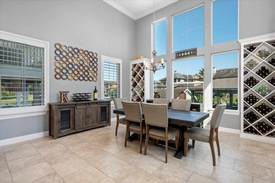211 Valmar Street Kemah, TX 77565 - Photo 30 of 50 a dining room with furniture and window