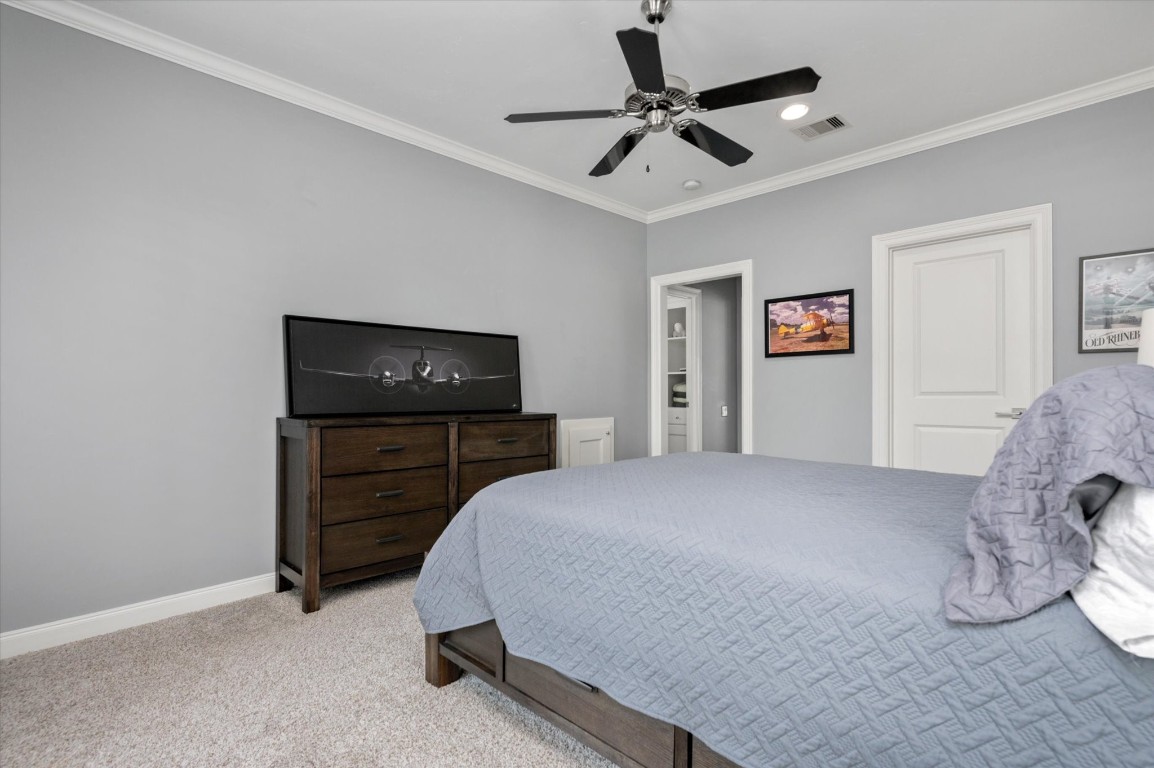 211 Valmar Street Kemah, TX 77565 - Photo 38 of 50 a bedroom with a bed and a television