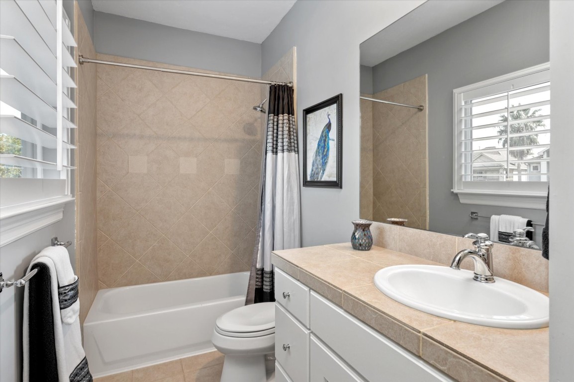 211 Valmar Street Kemah, TX 77565 - Photo 39 of 50 a bathroom with a sink toilet and shower