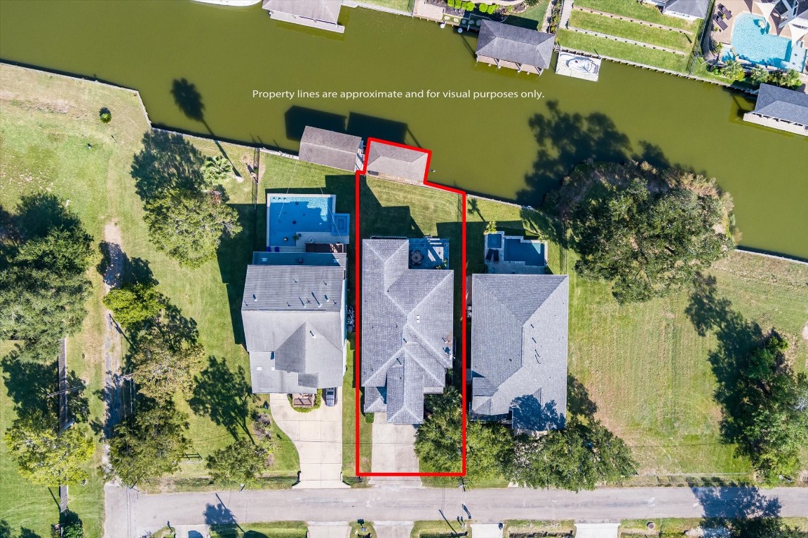 211 Valmar Street Kemah, TX 77565 - Photo 4 of 50 an aerial view of multiple houses with outdoor space