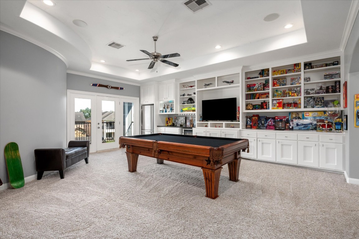211 Valmar Street Kemah, TX 77565 - Photo 41 of 50 a living room with furniture pool table and flat screen tv