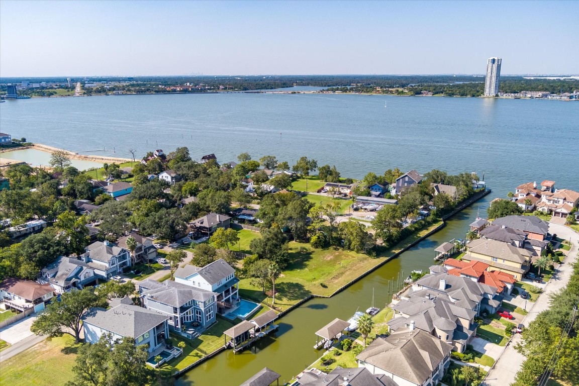 211 Valmar Street Kemah, TX 77565 - Photo 8 of 50 a view of a lake with a house