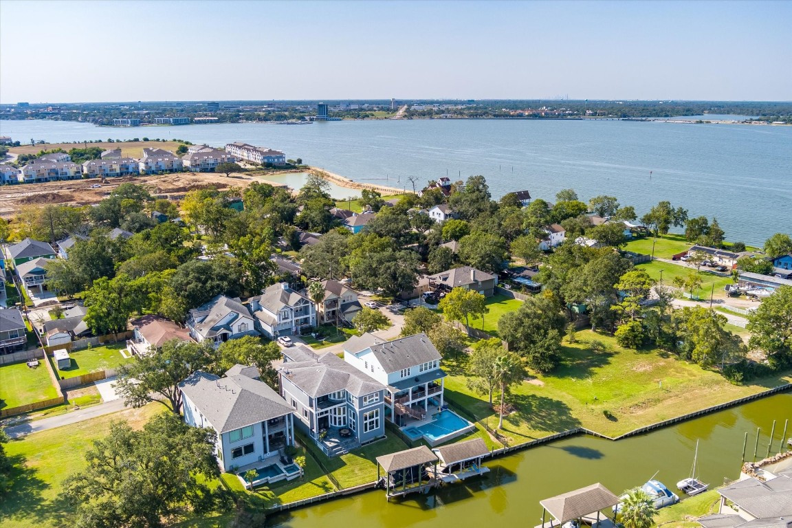 211 Valmar Street Kemah, TX 77565 - Photo 9 of 50 an aerial view of a house with a swimming pool and outdoor seating