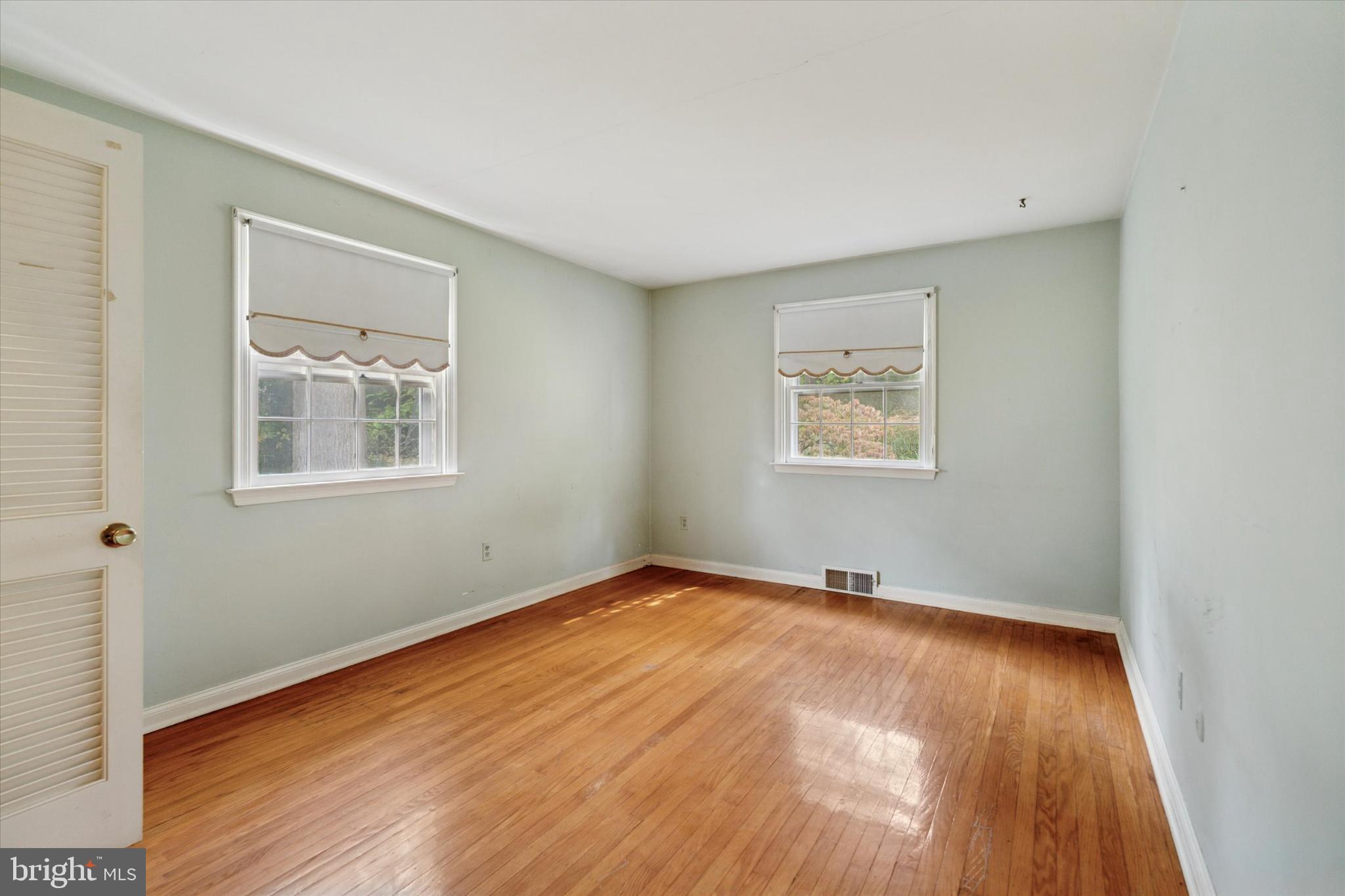 403 Atwater Road Broomall, PA 19008 - Photo 25 of 35 Bright and airy room with hardwood floors.