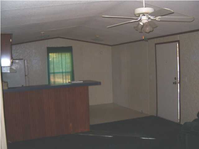 135 Henderson Road DeFuniak Springs, FL 32433 - Photo 8 of 14 a view of an empty room with a window