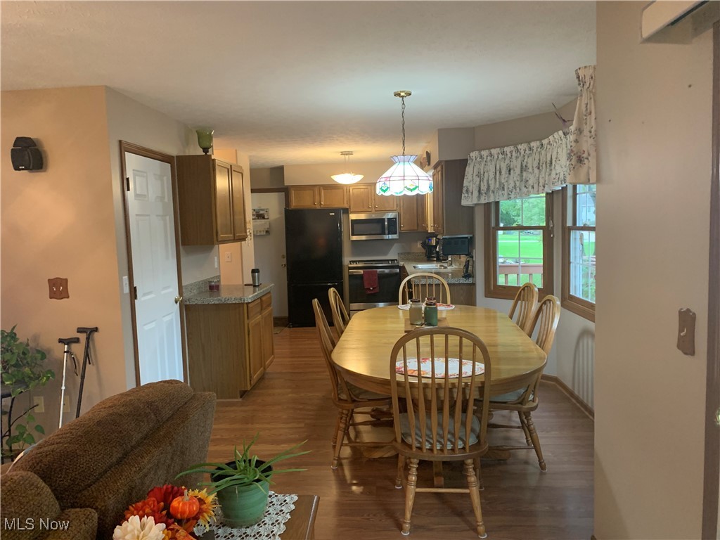 9046 Shepard Road Macedonia, OH 44056 - Photo 11 of 33 Eat in Kitchen with wood-style flooring and natural light from the bay window.