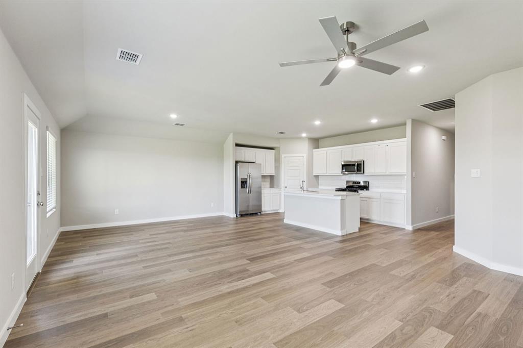 1149 Del Rio Drive Lavon, TX 75166 - Photo 27 of 27 a view of kitchen with cabinets and wooden floor