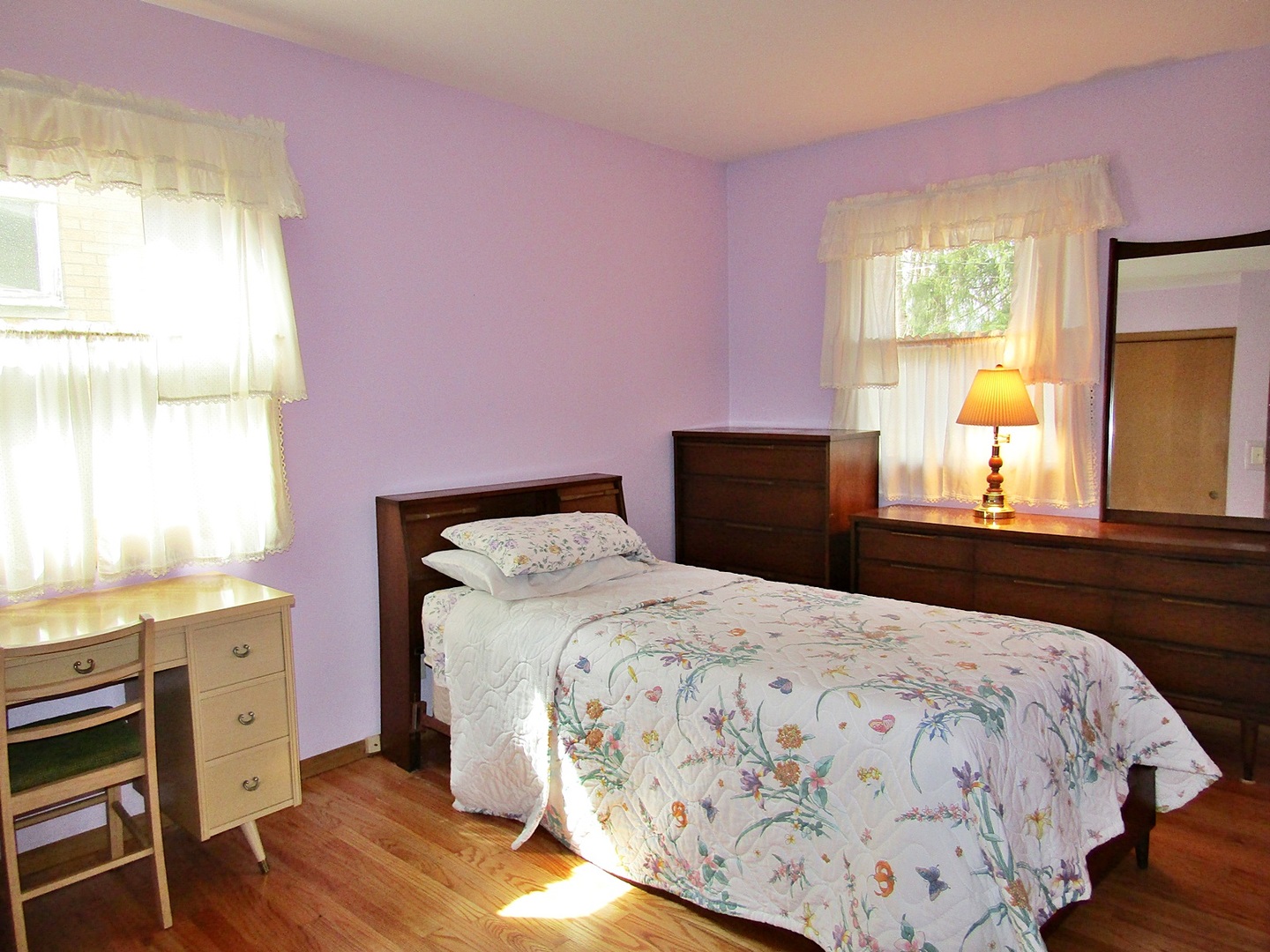 1408 Dunstan Road Geneva, IL 60134 - Photo 12 of 21 a bedroom with a bed and wooden floor