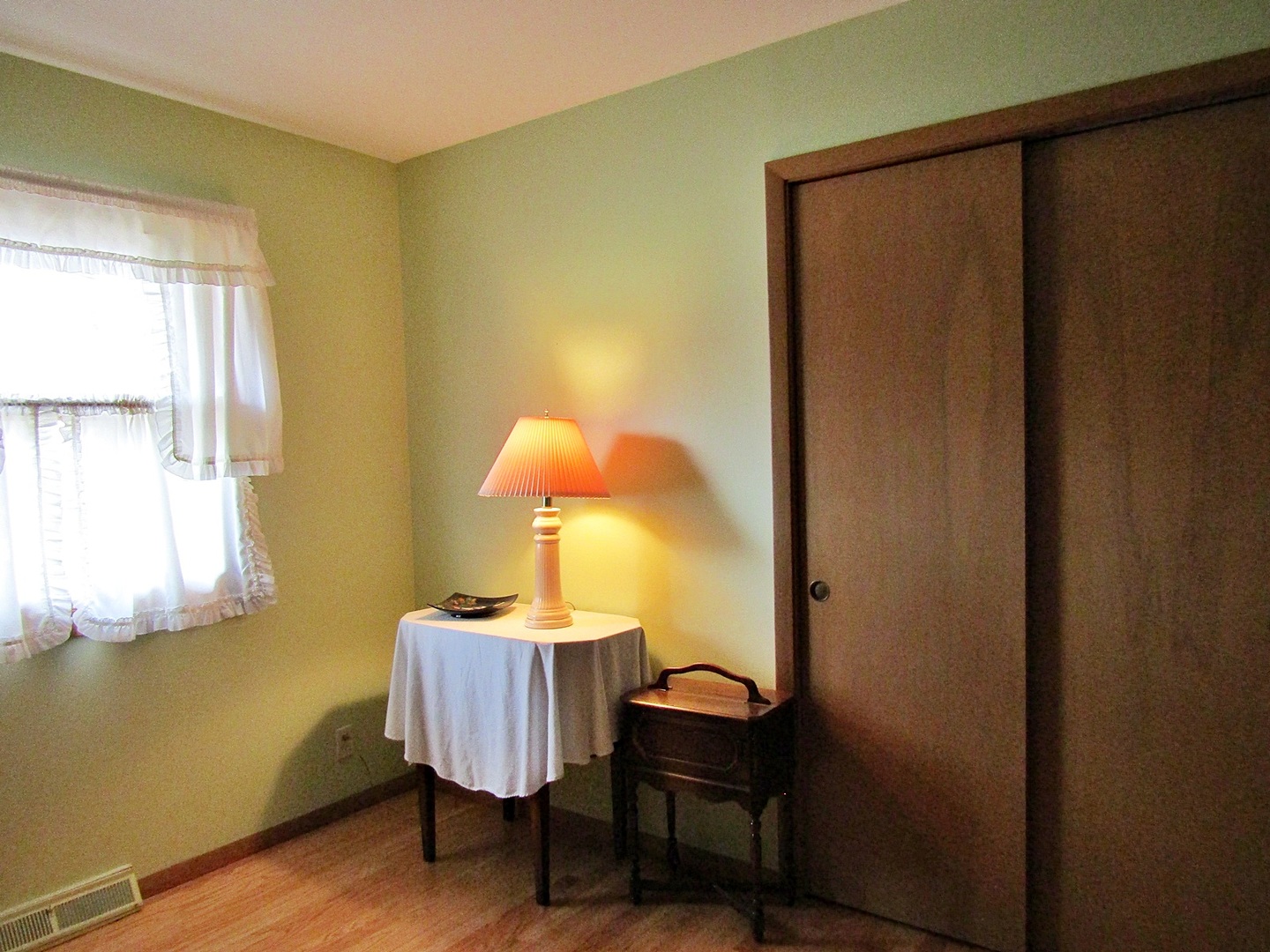 1408 Dunstan Road Geneva, IL 60134 - Photo 14 of 21 a lamp on a table next to a window