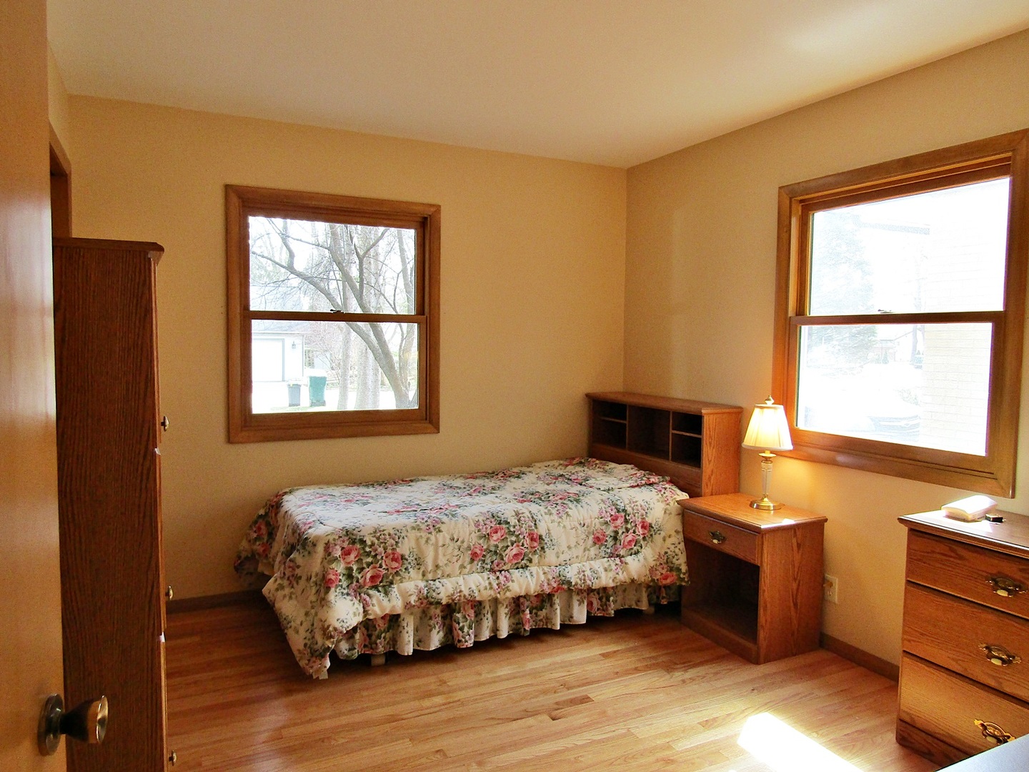 1408 Dunstan Road Geneva, IL 60134 - Photo 15 of 21 a bedroom with a bed and a window