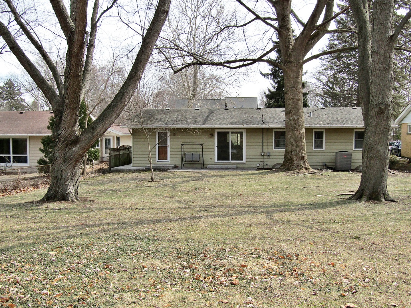 1408 Dunstan Road Geneva, IL 60134 - Photo 18 of 21 a front view of a house with a yard