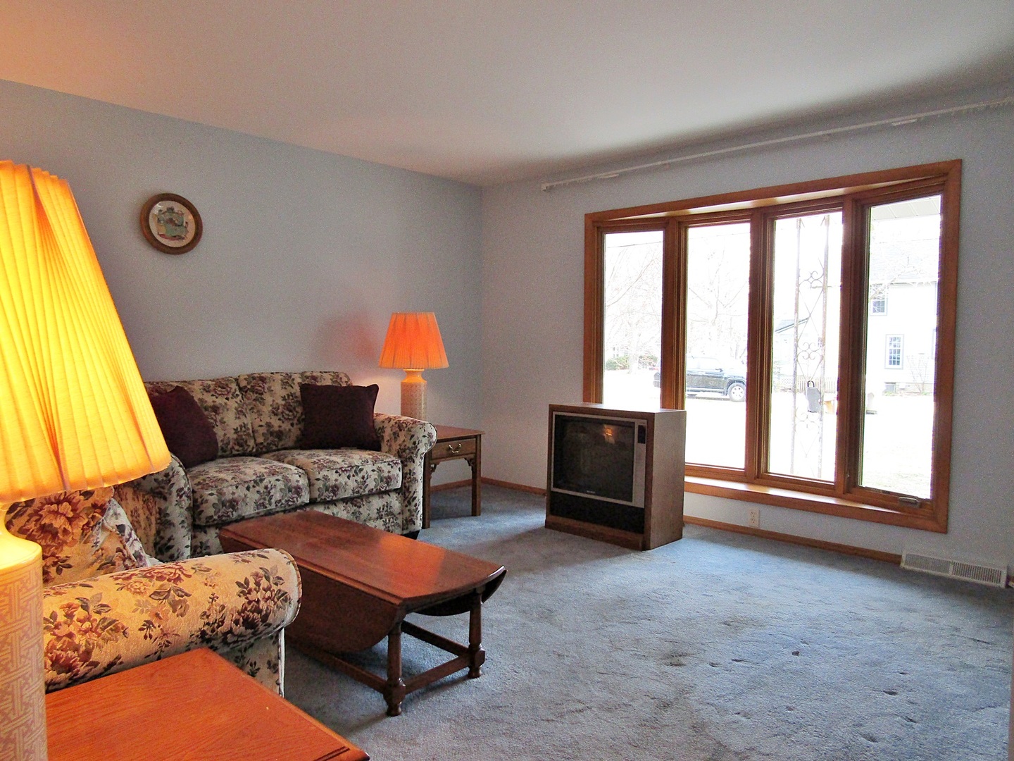 1408 Dunstan Road Geneva, IL 60134 - Photo 5 of 21 a living room with furniture and a large window