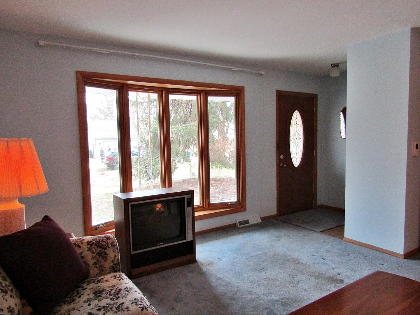 1408 Dunstan Road Geneva, IL 60134 - Photo 6 of 21 a living room with furniture and a large window