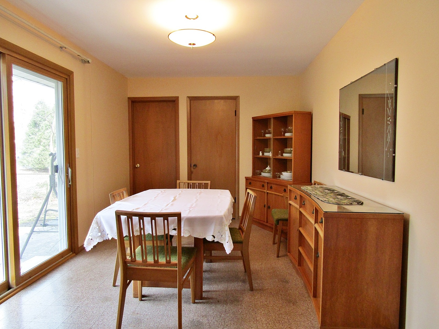 1408 Dunstan Road Geneva, IL 60134 - Photo 7 of 21 a view of a dining room with furniture and wooden floor