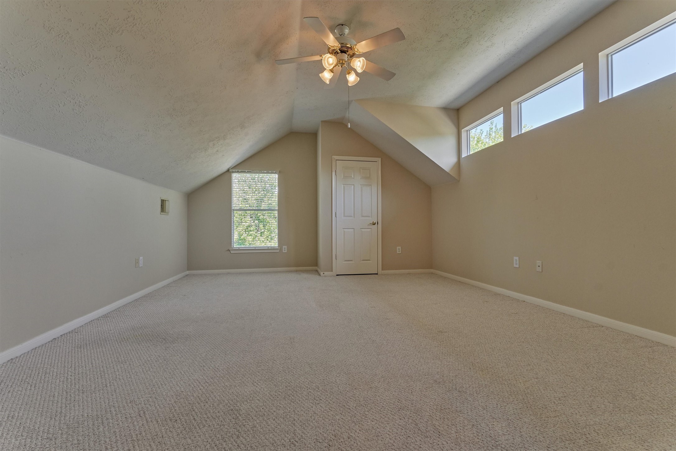 175 West Lilac Ridge Place The Woodlands, TX 77384 - Photo 22 of 31 a view of an empty room with a window