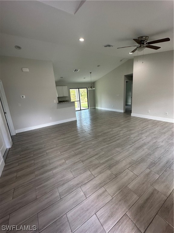 2115 Robert Avenue Alva, FL 33920 - Photo 2 of 11 wooden floor in an empty room with a window