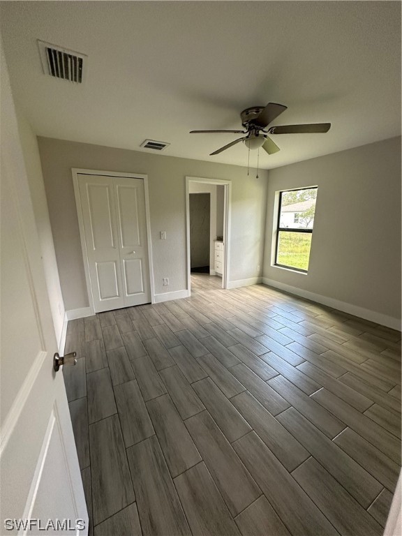 2115 Robert Avenue Alva, FL 33920 - Photo 8 of 11 wooden floor in an empty room with a window