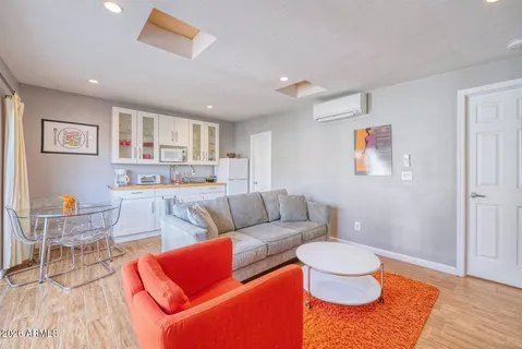a utility room with sink dryer and washer