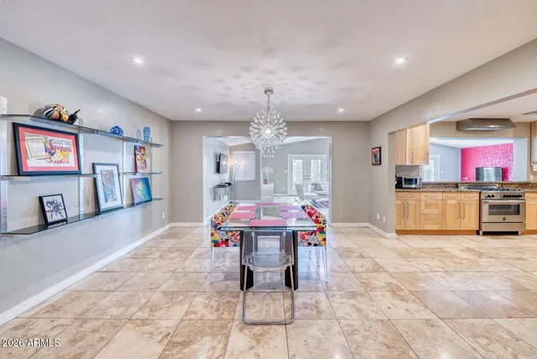 a view of a living room and kitchen