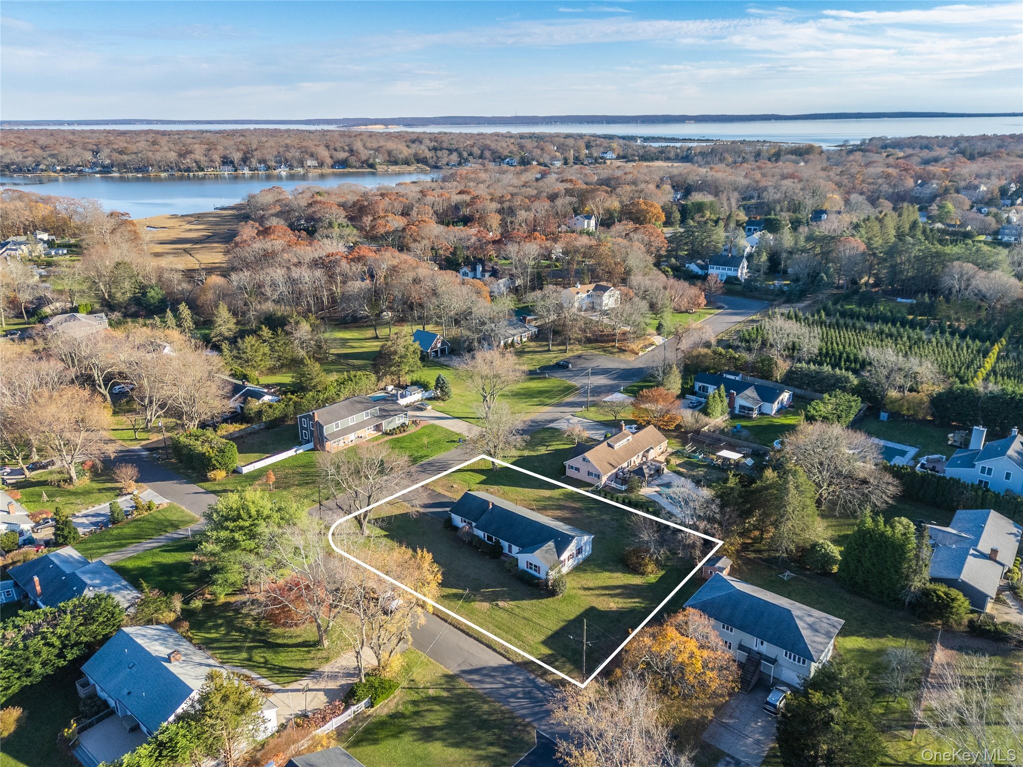 280 Clearview Avenue Southold, NY 11971 - Photo 31 of 41 Aerial overview of property's location featuring nearby suburban area, property parcel outlined, and a large body of water