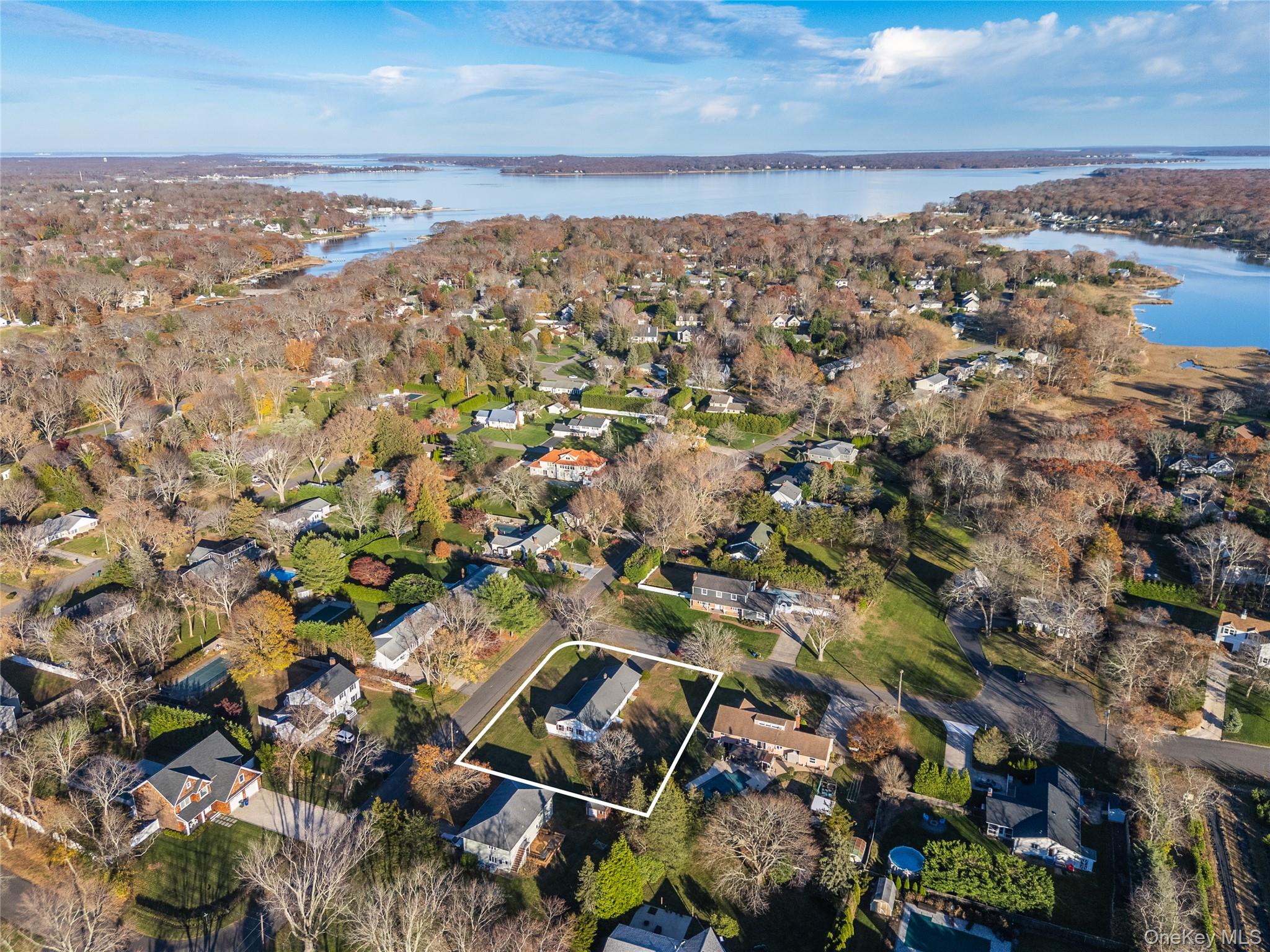 280 Clearview Avenue Southold, NY 11971 - Photo 39 of 41 Aerial overview of property's location with nearby suburban area, property boundaries highlighted, and a nearby body of water