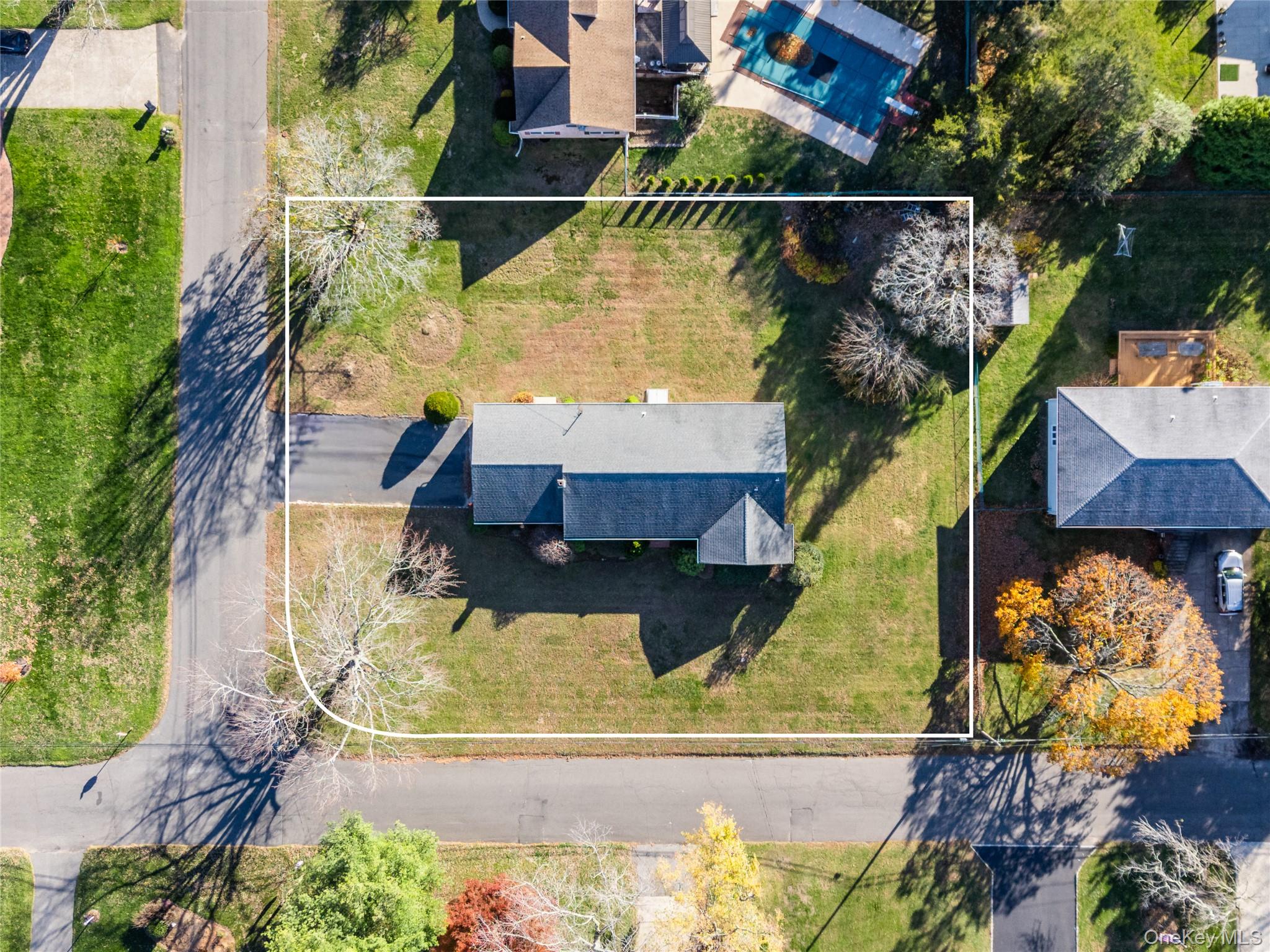 280 Clearview Avenue Southold, NY 11971 - Photo 41 of 41 Aerial view of property and surrounding area featuring property parcel outlined and a pool