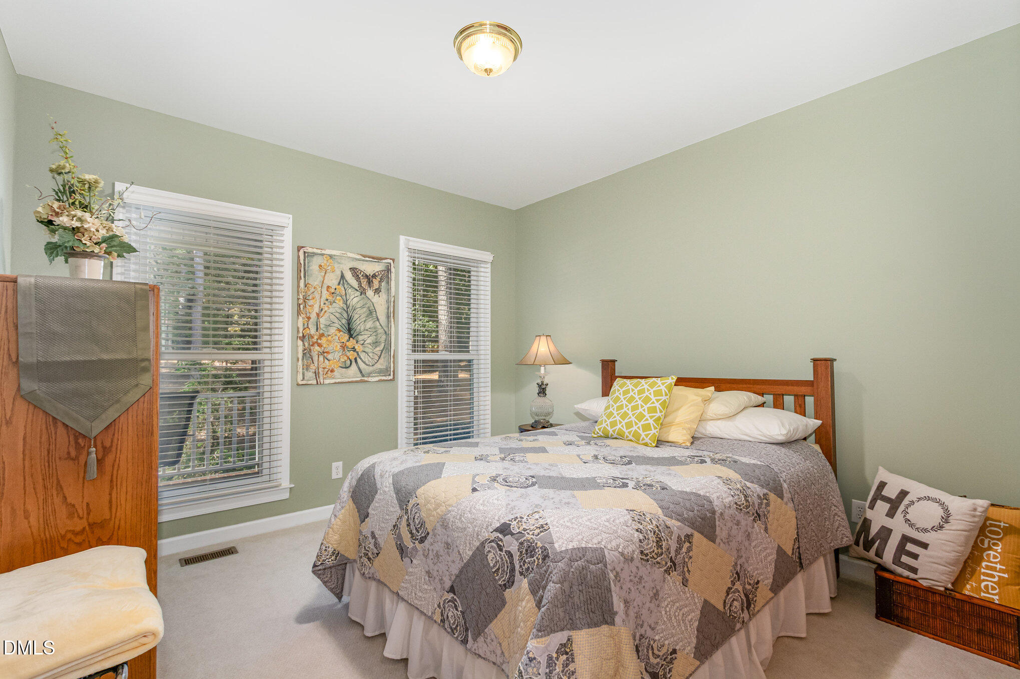 6018 West Tom Parham Road Oxford, NC 27565 - Photo 17 of 36 a bedroom with a bed and a window