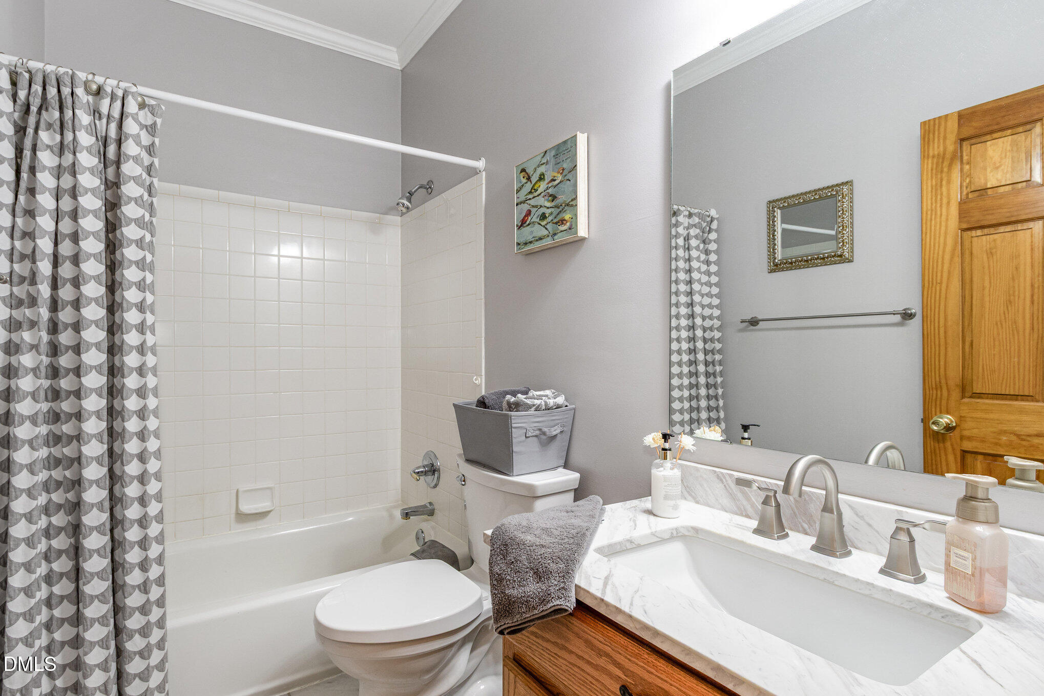 6018 West Tom Parham Road Oxford, NC 27565 - Photo 18 of 36 a bathroom with a sink toilet and shower