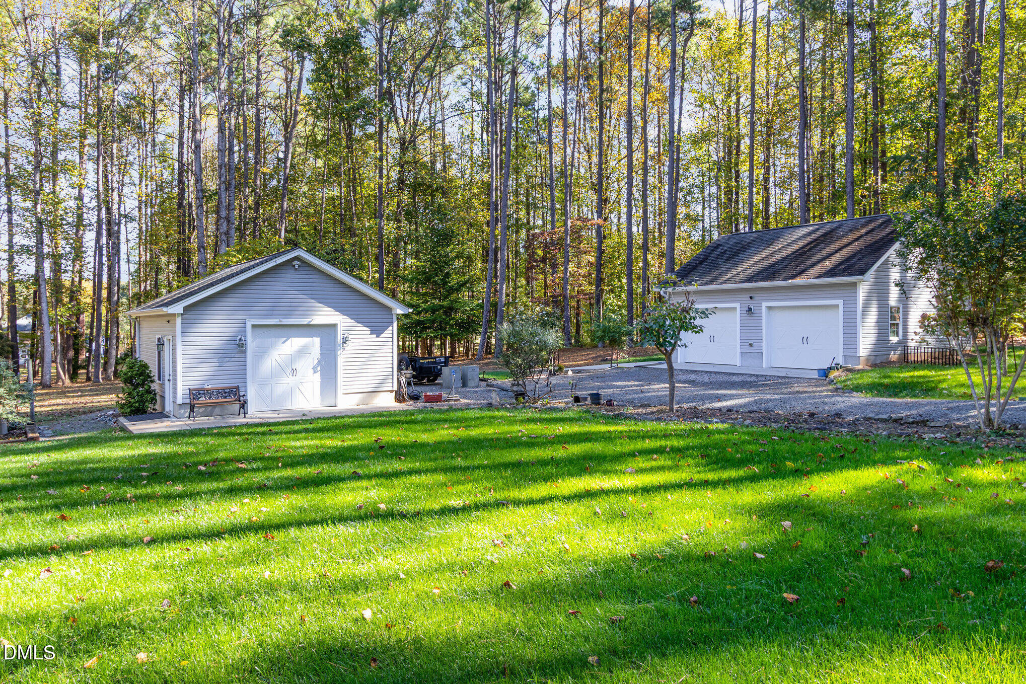 6018 West Tom Parham Road Oxford, NC 27565 - Photo 33 of 36 a front view of a house with a yard and trees