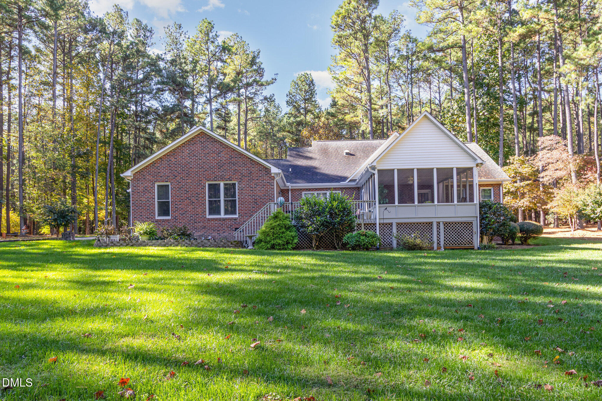 6018 West Tom Parham Road Oxford, NC 27565 - Photo 34 of 36 a front view of a house with a garden