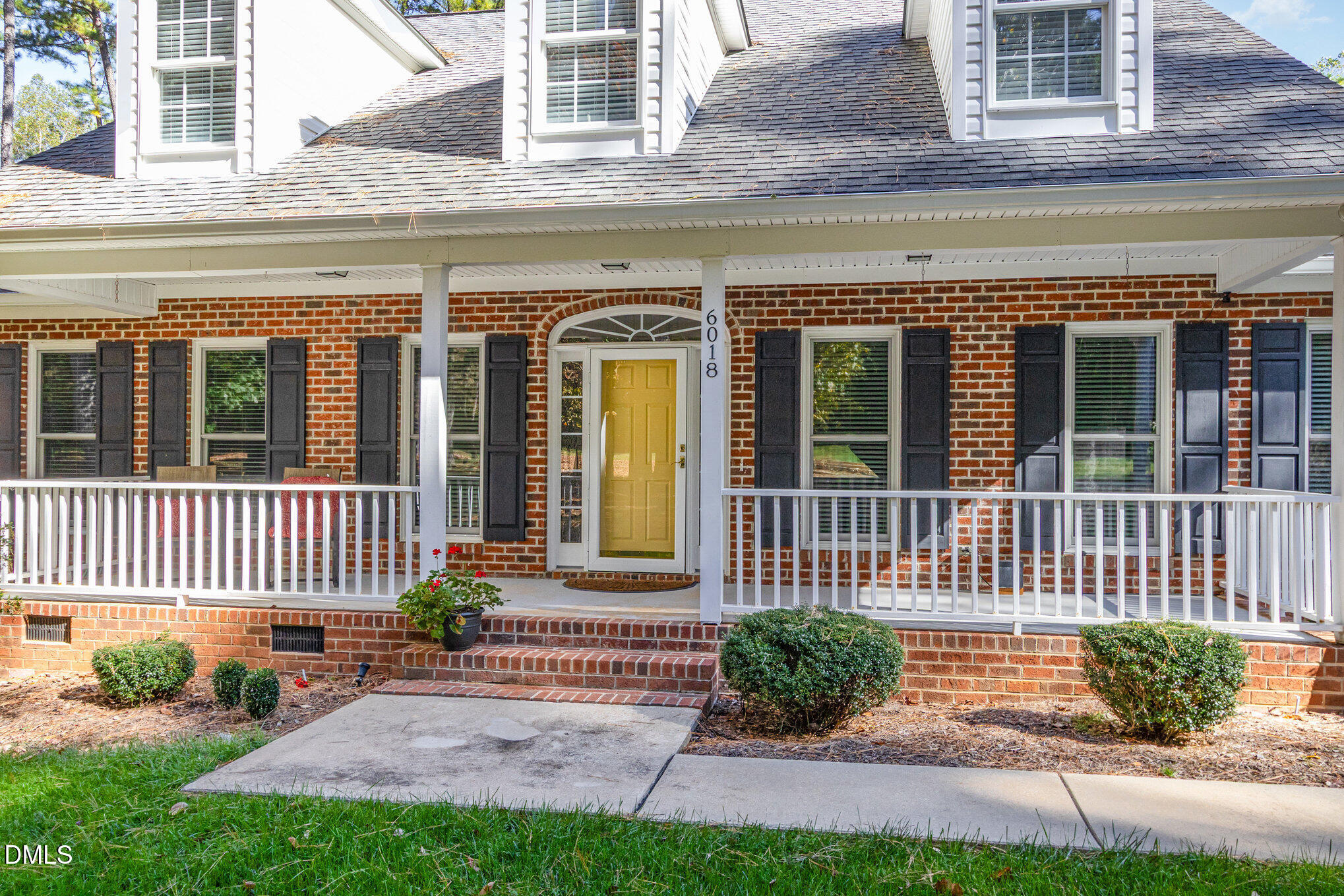 6018 West Tom Parham Road Oxford, NC 27565 - Photo 3 of 36 a front view of a house