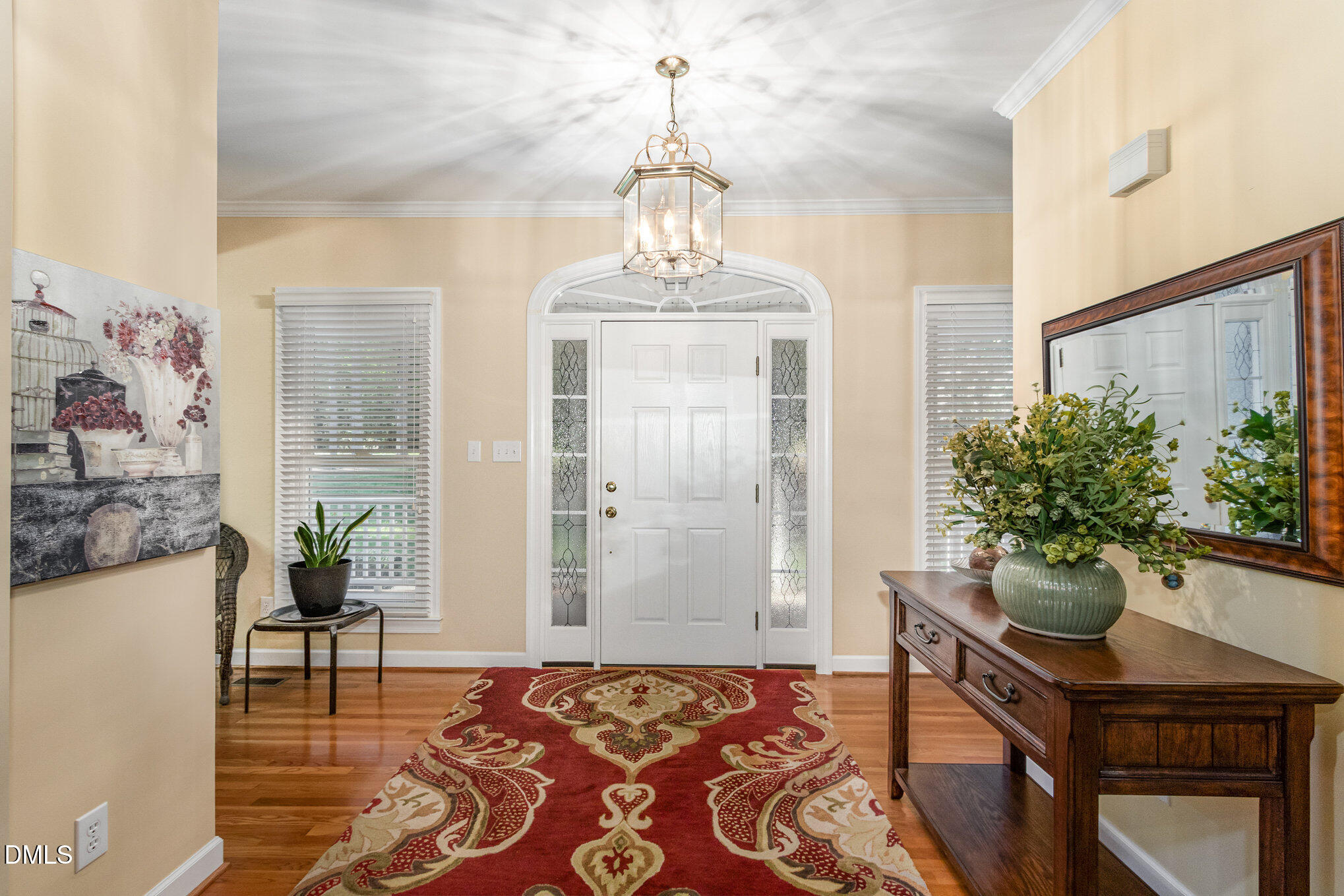 6018 West Tom Parham Road Oxford, NC 27565 - Photo 4 of 36 a living room with furniture and flowers