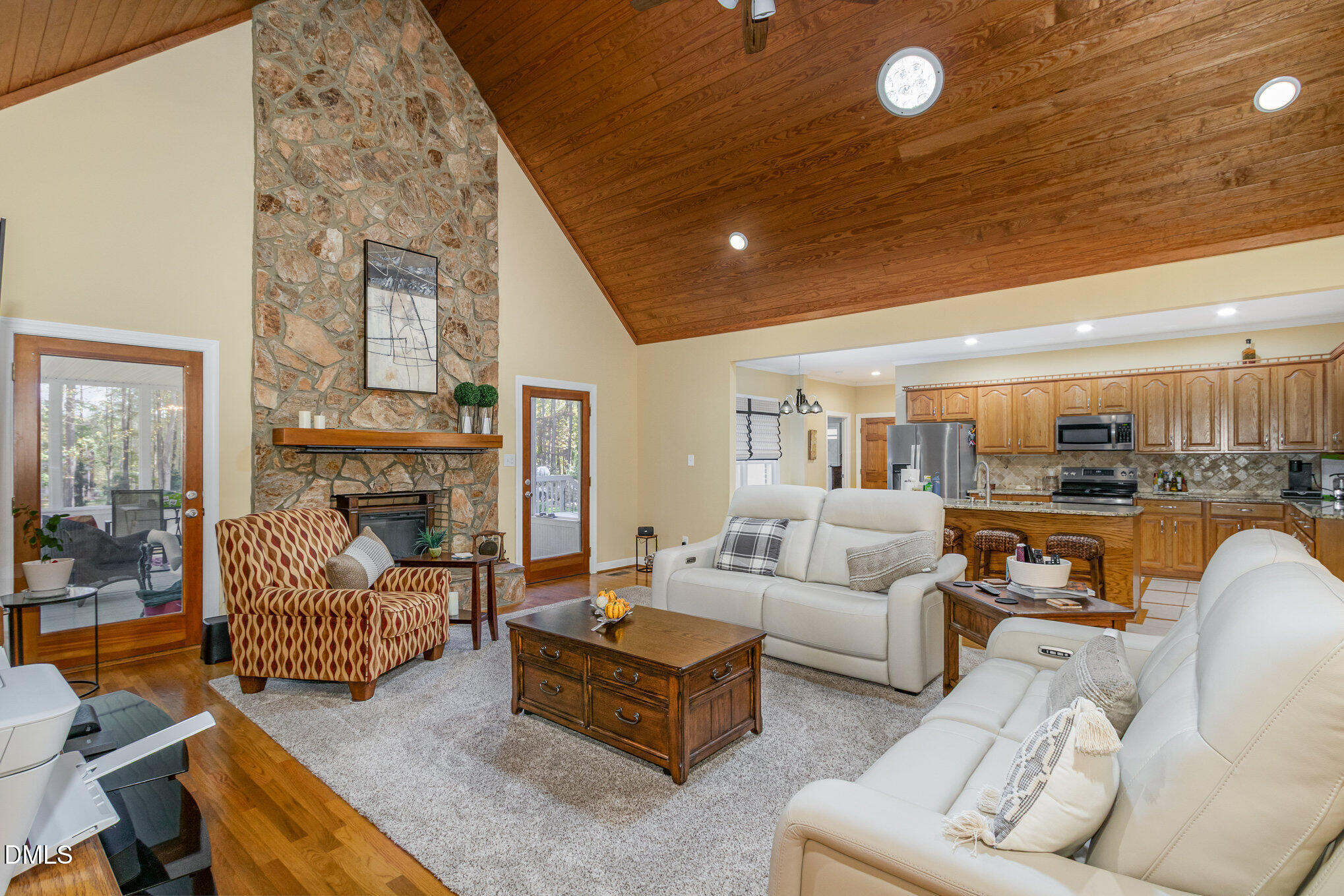 6018 West Tom Parham Road Oxford, NC 27565 - Photo 5 of 36 a living room with furniture and a fireplace
