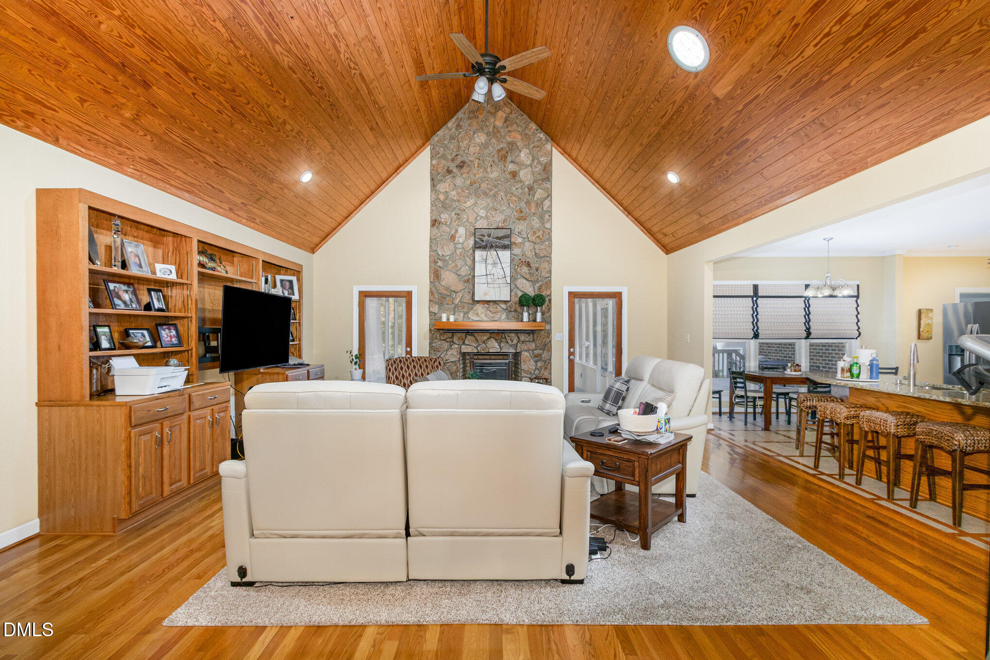6018 West Tom Parham Road Oxford, NC 27565 - Photo 6 of 36 a living room with furniture and a flat screen tv