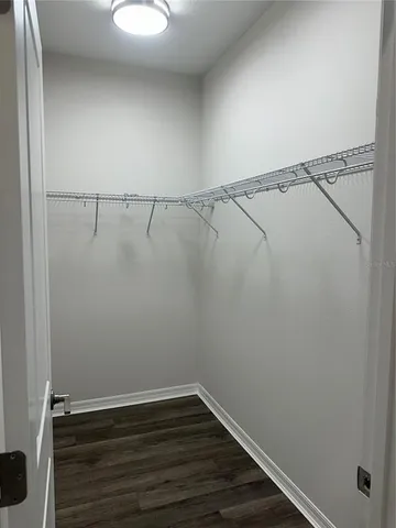 a view of a room with racks on the wall