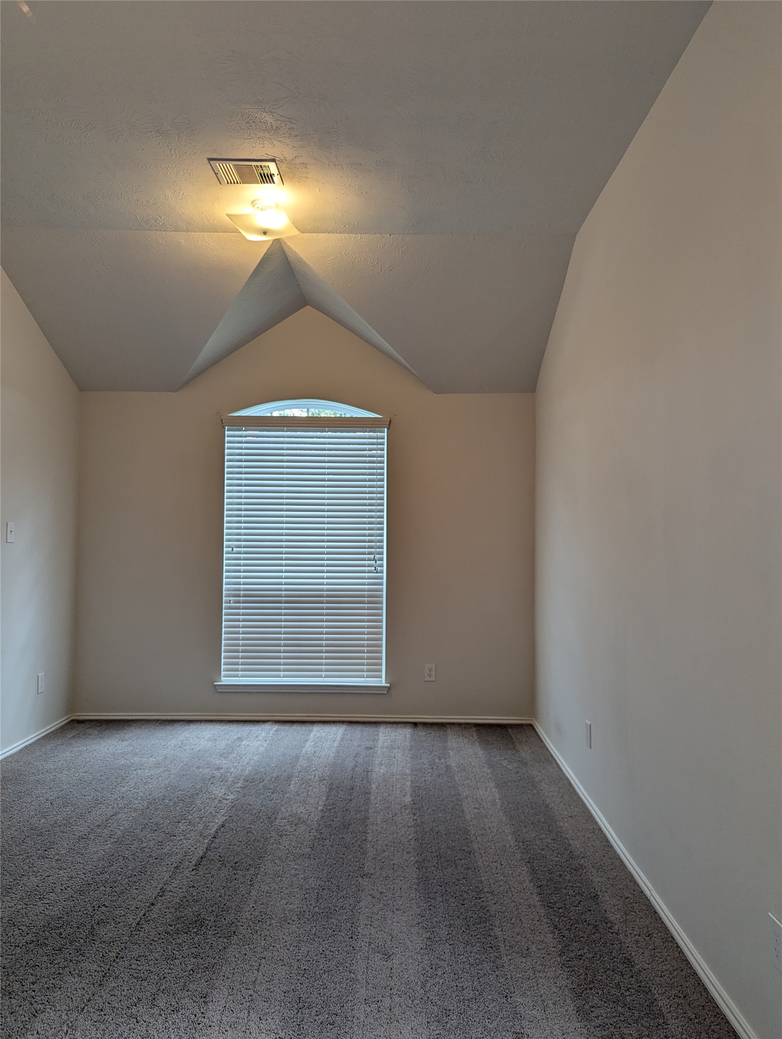 13319 Lansdown Street Rosharon, TX 77583 - Photo 3 of 22 an empty room with a window