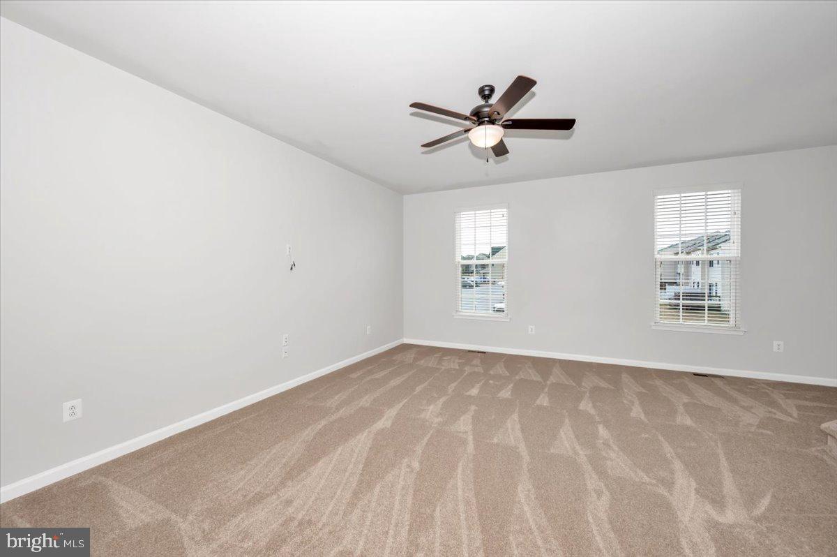 105 Montreal Way Falling Waters, WV 25419 - Photo 12 of 53 a view of a big room with closet and windows