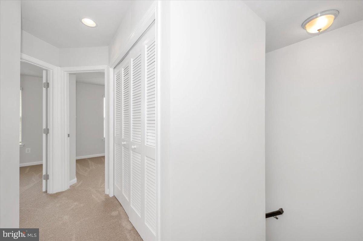 105 Montreal Way Falling Waters, WV 25419 - Photo 31 of 53 a view of a hallway with wooden floor