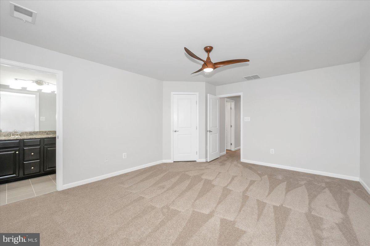 105 Montreal Way Falling Waters, WV 25419 - Photo 37 of 53 a view of a big room with a kitchen