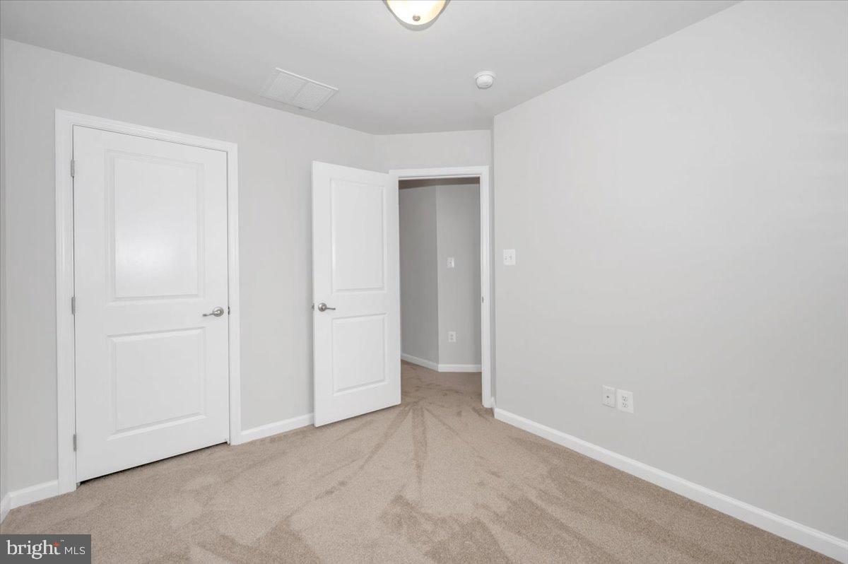 105 Montreal Way Falling Waters, WV 25419 - Photo 41 of 53 an empty room with closet area