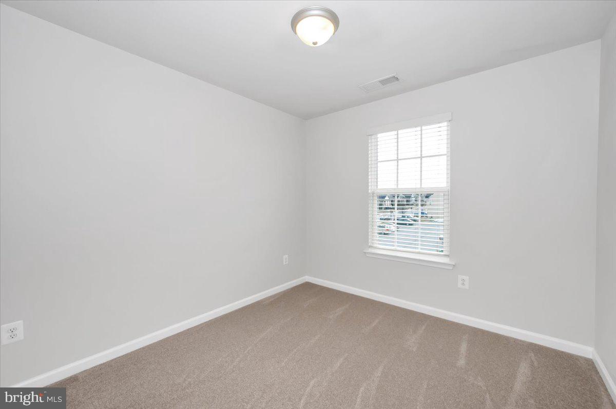 105 Montreal Way Falling Waters, WV 25419 - Photo 42 of 53 an empty room with a window