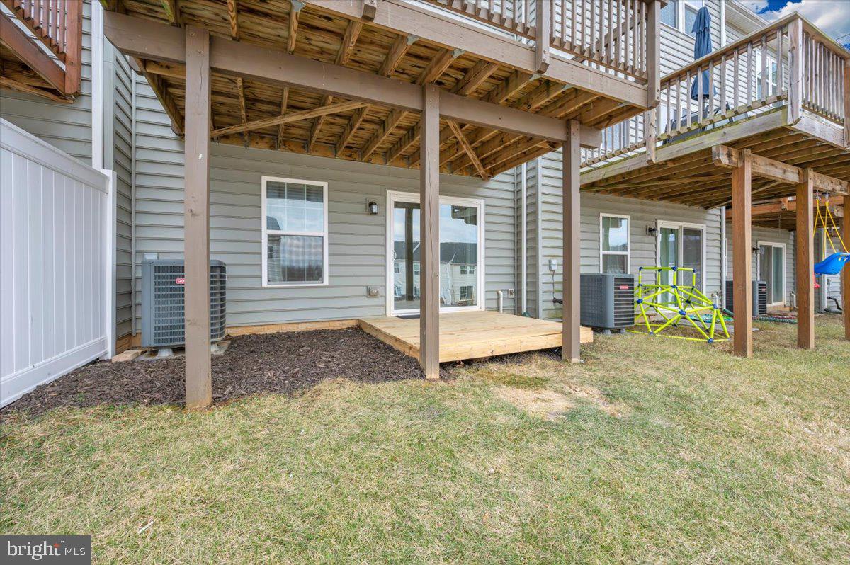105 Montreal Way Falling Waters, WV 25419 - Photo 47 of 53 a view of a house with porch and furniture
