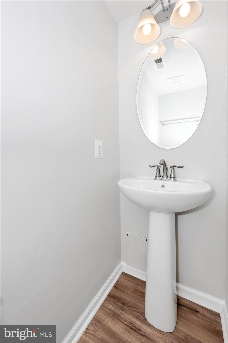 105 Montreal Way Falling Waters, WV 25419 - Photo 9 of 53 a bathroom with a sink and a mirror