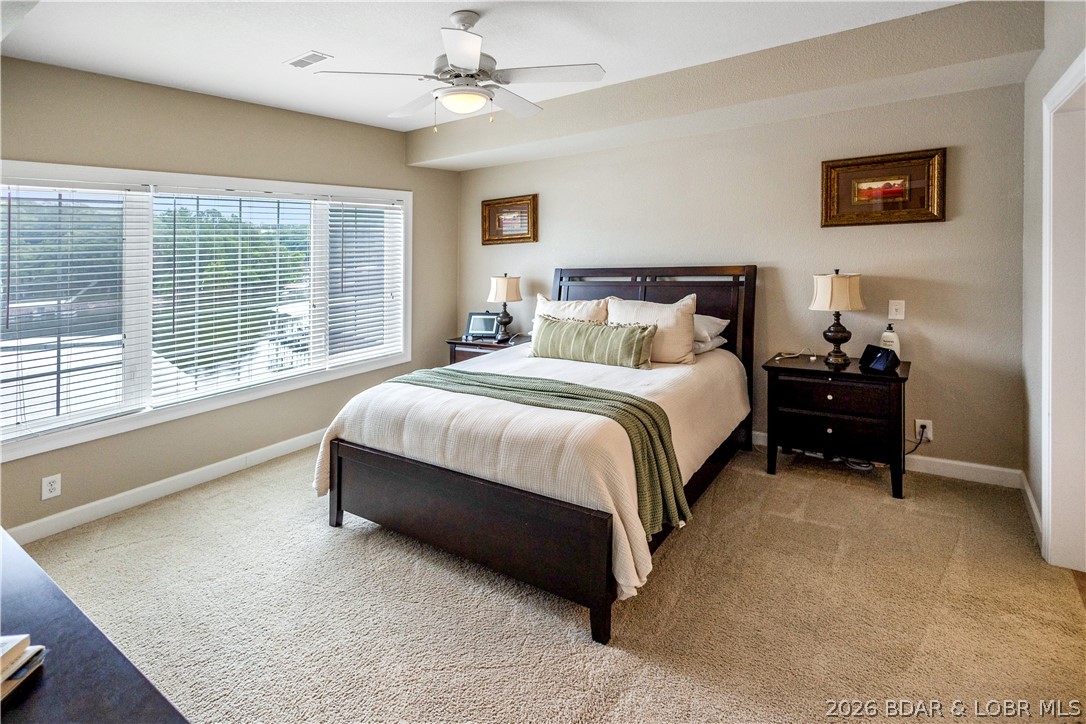 68 Lighthouse Road, Unit 121 Lake Ozark, MO 65049 - Photo 6 of 30 Master bedroom.