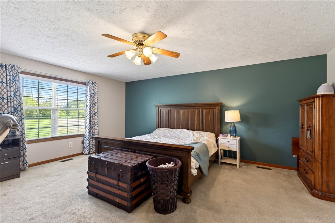 4996 Shannon Avenue Springfield, OH 45504 - Photo 33 of 61 This spacious bedroom offers a tranquil retreat with ample natural light.