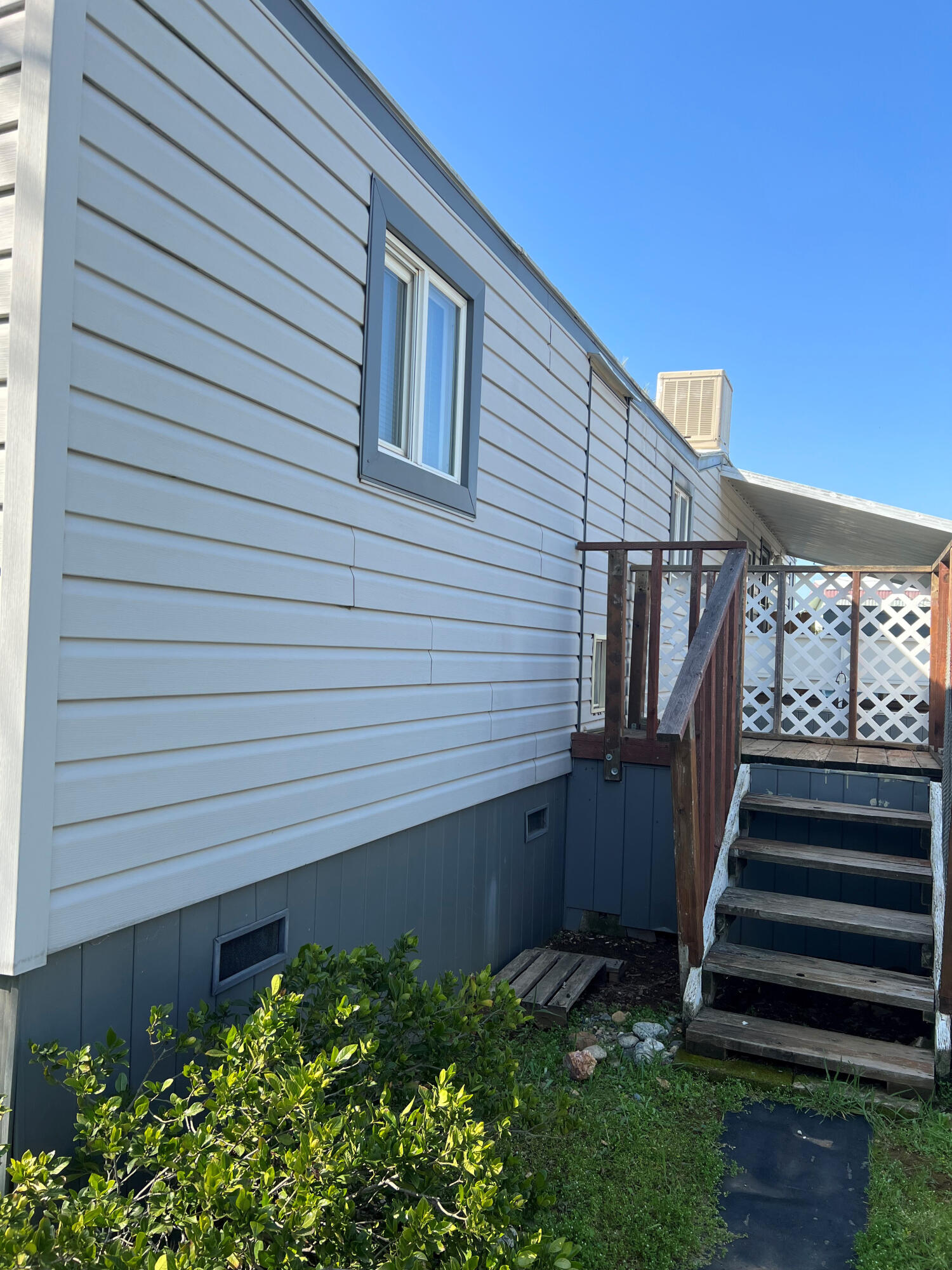 Undisclosed Address Redding, CA 96002 - Photo 6 of 7 a backyard of a house with lots of green space