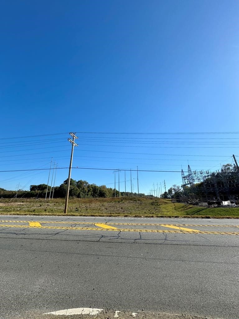 3737 South Dixie Road Dalton, GA 30721 - Photo 5 of 6 a view of a swimming pool with a table and chairs
