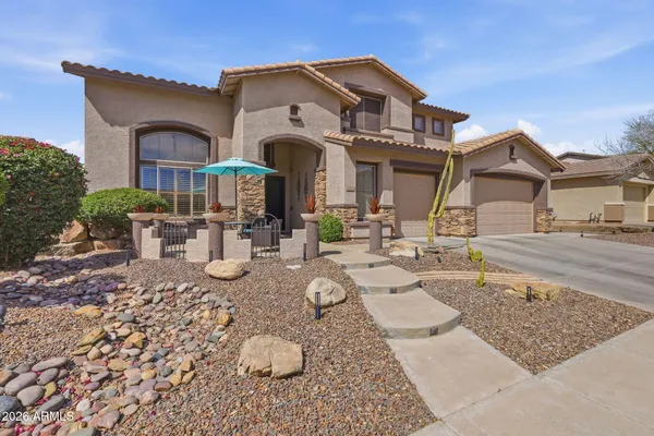 a front view of a house with patio