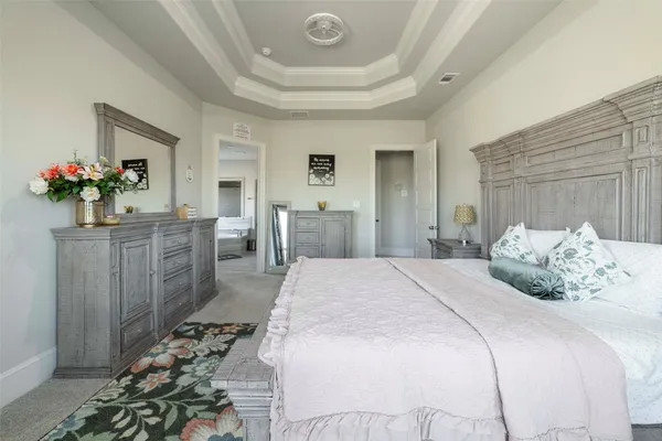 a spacious bathroom with a sink a mirror and a bathtub