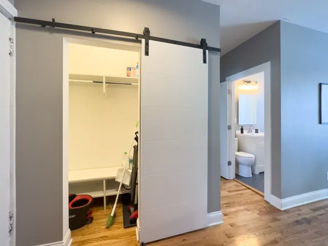 a bathroom with a shower and a toilet